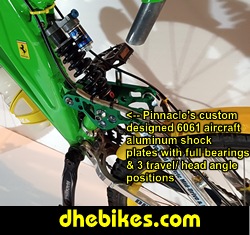 Custom made 6061 aircraft aluminum rear suspension linkage plates with full set of bearings and multiple head angle and travel adjustable positions with quick release shock bolt.
